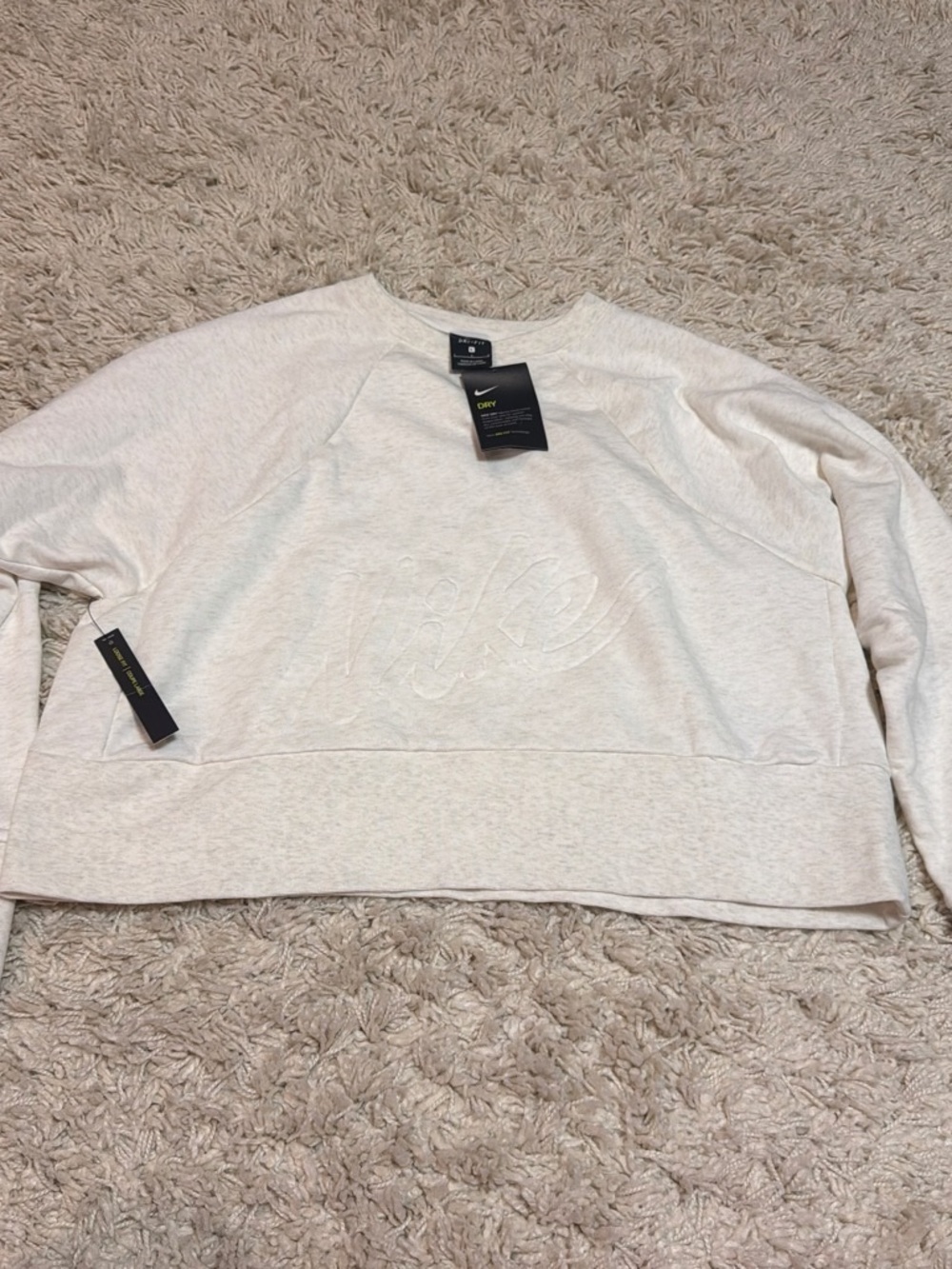 Nike Women's Light Cream Embossed Logo Crewneck Sweatshirt
